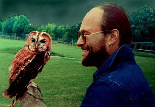 Rinpoche holding an owl